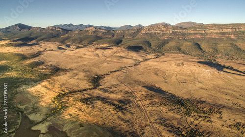 Aerial landscape view in the late afternoon of the Southern Escarpment of Wilpena Pound in the Flinders Ranges, South Australia.