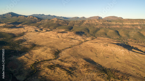 Aerial landscape view in the late afternoon of the Southern Escarpment of Wilpena Pound in the Flinders Ranges, South Australia.