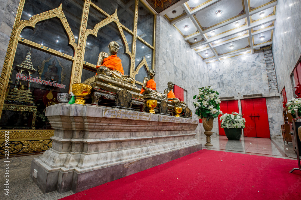 Fototapeta premium Phuket: September 17, 2018, at night, inside and outside the church, Wat Chaithararam, is one of Phuket's major temples in Chao Fah Tawan Tok Rd., Tambon Chalong, Amphoe Mueang Phuket, Thailand.