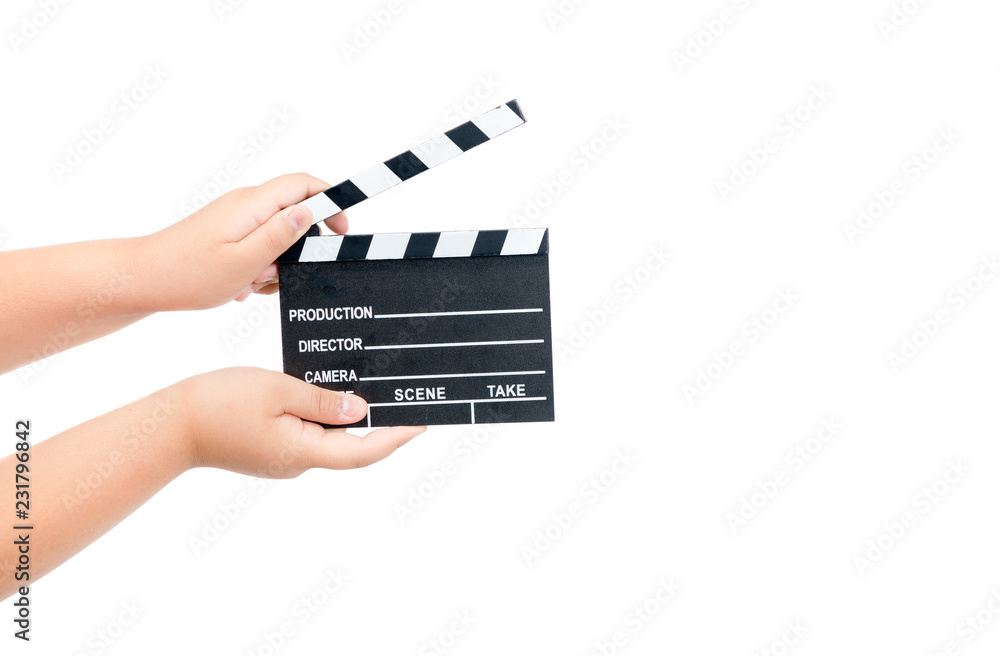 Child holding movie clapper isolated on white