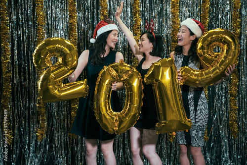 ladies dancing with gold 2019 new year balloon photo