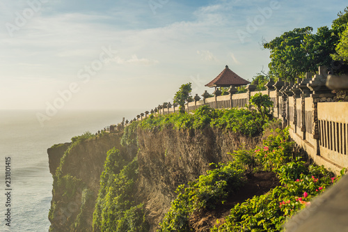 Pura Luhur Uluwatu temple, Bali, Indonesia. Amazing landscape - cliff with blue sky and sea