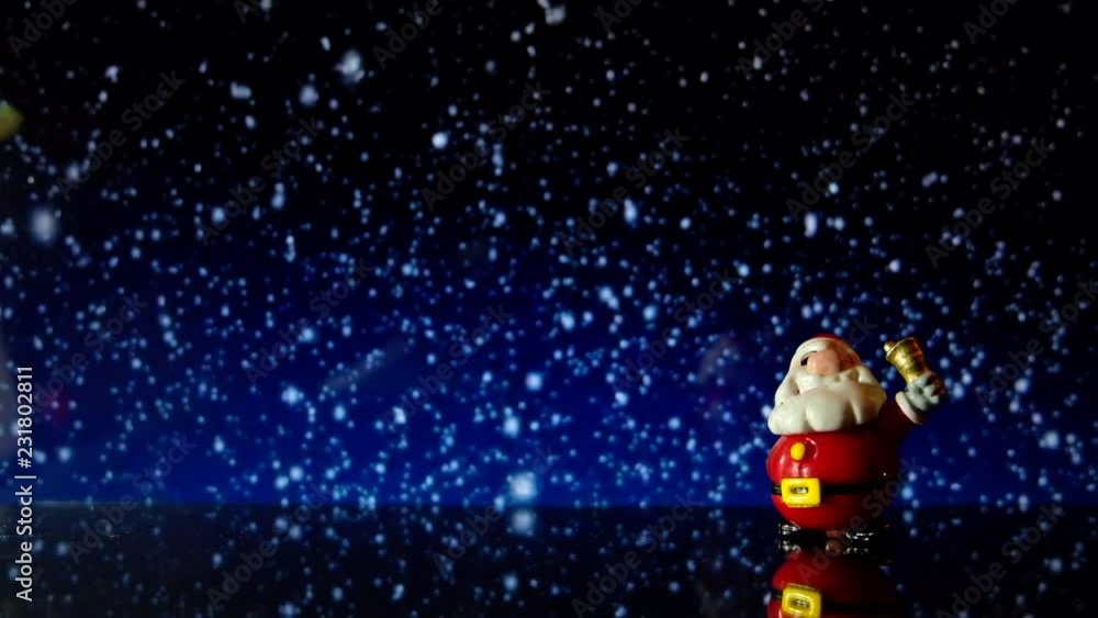 Santa Claus Merry Christmas and Happy New Year. Front, distant with bell on snowing background. Santa Claus Merry Christmas and Happy New Year. Front, distant with bell on snowing background.