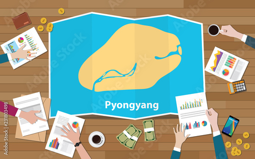 pyongyang north korea capital city region economy growth with team discuss on fold maps view from top