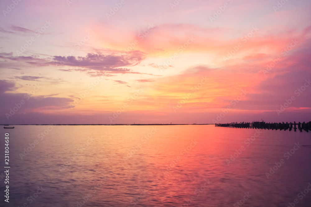 Beautiful panoramic view of ocean tranquil at sunset,Two boats are stationary.copy space For text. Beautiful panoramic view of ocean tranquil at sunset,Two boats are stationary.copy space For text.