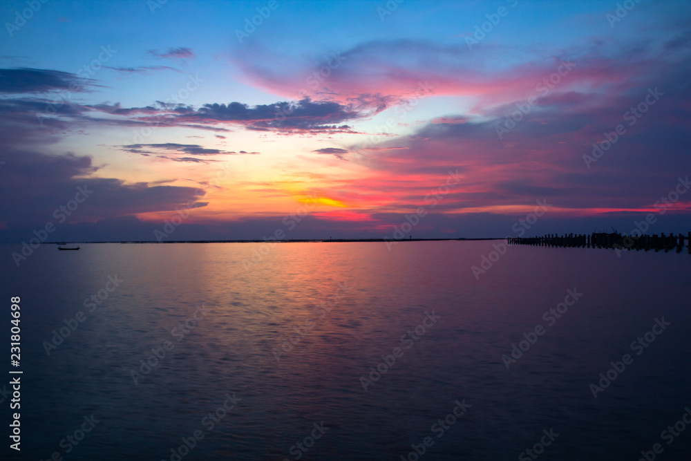 Beautiful panoramic view of  ocean tranquil at sunset,Two boats are stationary.copy space For text.