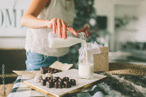 woman pouring milk during the holiday season