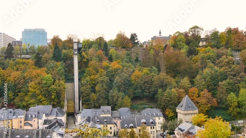 View on Luxembourg city. There is the panoramic elevator which connects the Pfaffenthal district (below) to the Ville-Haute (the Upper Town) district. Filmed in October 2018, during the fall. photo