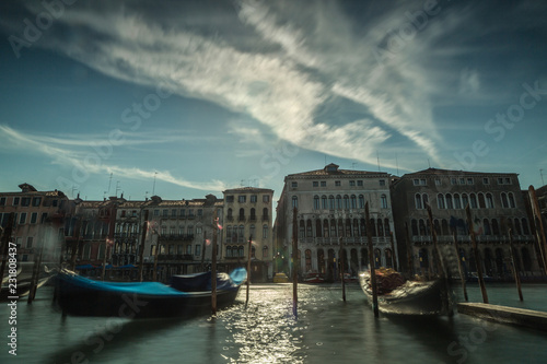 View on two parked gondolas in Grand Canal long exposure shot
