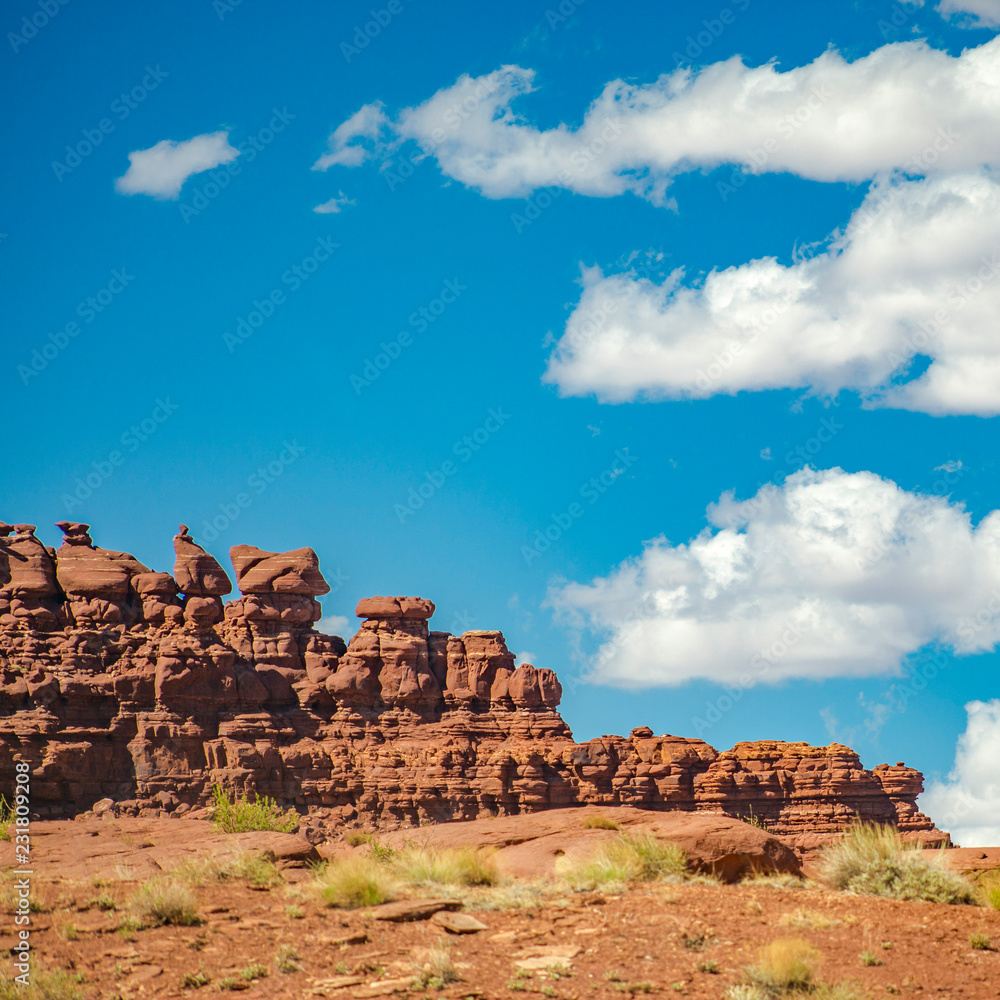 Amazing red rocks in Moab under sky and clouds