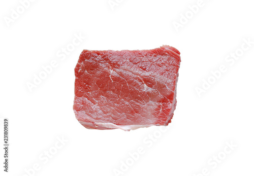 Raw beef meat isolated over white background. Top view.