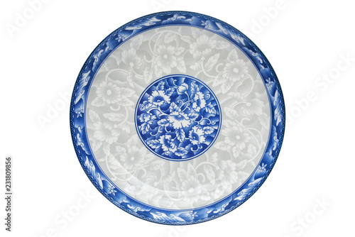 Blue and white porcelain of the flower pattern on dish isolated on white background. Above view.