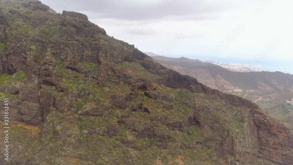 TENERIFE, SPAIN - MAY 18, 2018: Aerial view of rocky mountains in Hell gorge, Canary islands TENERIFE, SPAIN - MAY 18, 2018: Aerial view of rocky mountains in Hell gorge, Canary islands