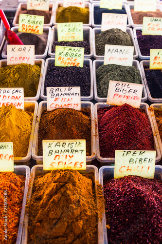 Many colorful spices are sold in the market. Eastern culture is a lot of spices in food. Spicy, sour and sweet spices. Turkish market. Indian market. Ingredients for cooking.