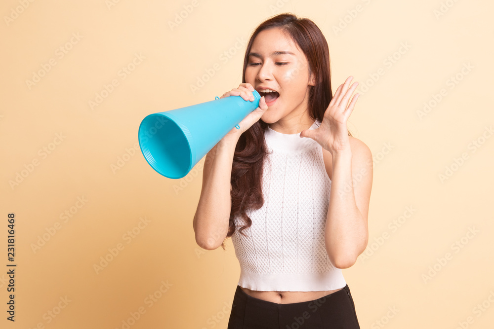 Beautiful young Asian woman announce with megaphone.