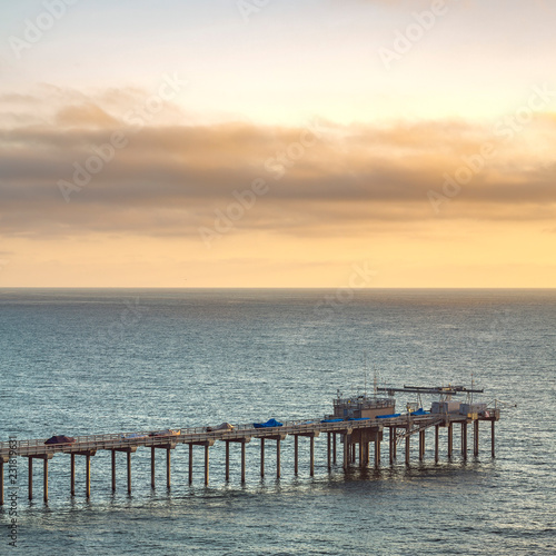 Ocean and horizon view in Scripps Pier at sunset