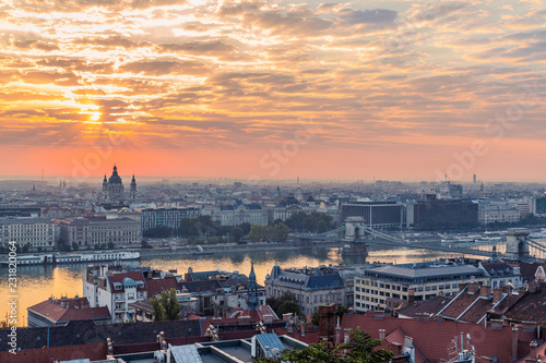 Fisherman s Bastion is an important landmark of Budapest. View of the city from a height  panorama at sunrise. Monument of historical architecture. The Danube River is far away. Morning in the fog. Wh