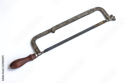 Vintage old handle saw on white background, Isolate carpenter tool handcraft wood working 