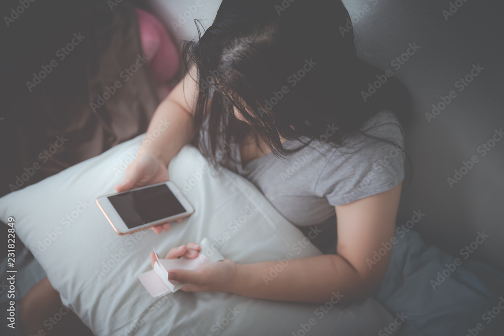 girl using a smartphone with paying bill, debt girl using a smartphone with paying bill, debt