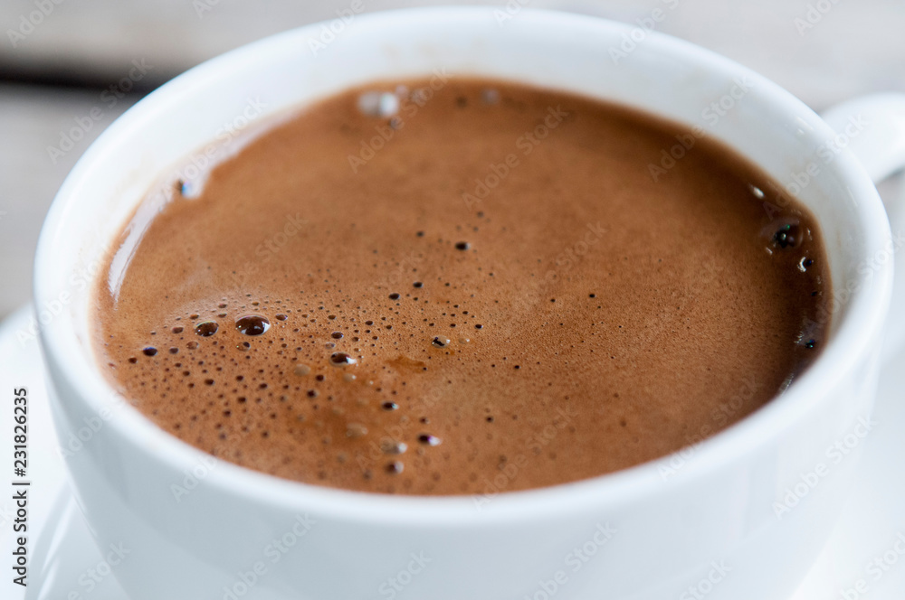 Top view of a cup of coffee isolated on white background Top view of a cup of coffee isolated on white background