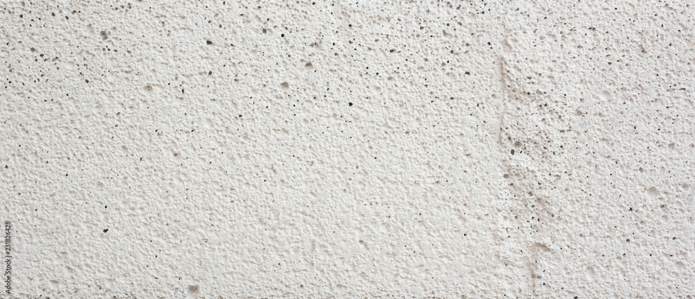 Fototapeta premium Close-up surface and rough white concrete pattern.