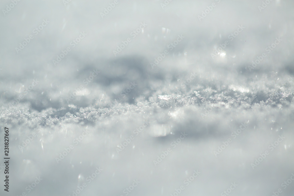 Snow texture. Snowflake crystals. Macro photo