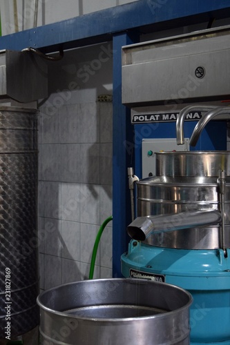 Olive oil squeeze.The process of extraction of olive oil of the first extraction at the plant obtained from olives, the last phase, separated by water with the help of machines, comes out with pure, t
