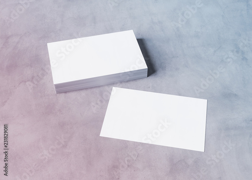 Stack of business card mockup on concrete 3d rendering