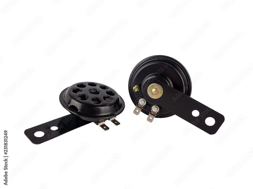 Motorcycle round electric horn speaker DC 12V, The mounting bracket fits many motorcycle models isolated on white background. Motorcycle round electric horn speaker DC 12V, The mounting bracket fits many motorcycle models isolated on white background.