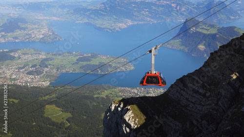 Cable car descending in the Swisse Alps.