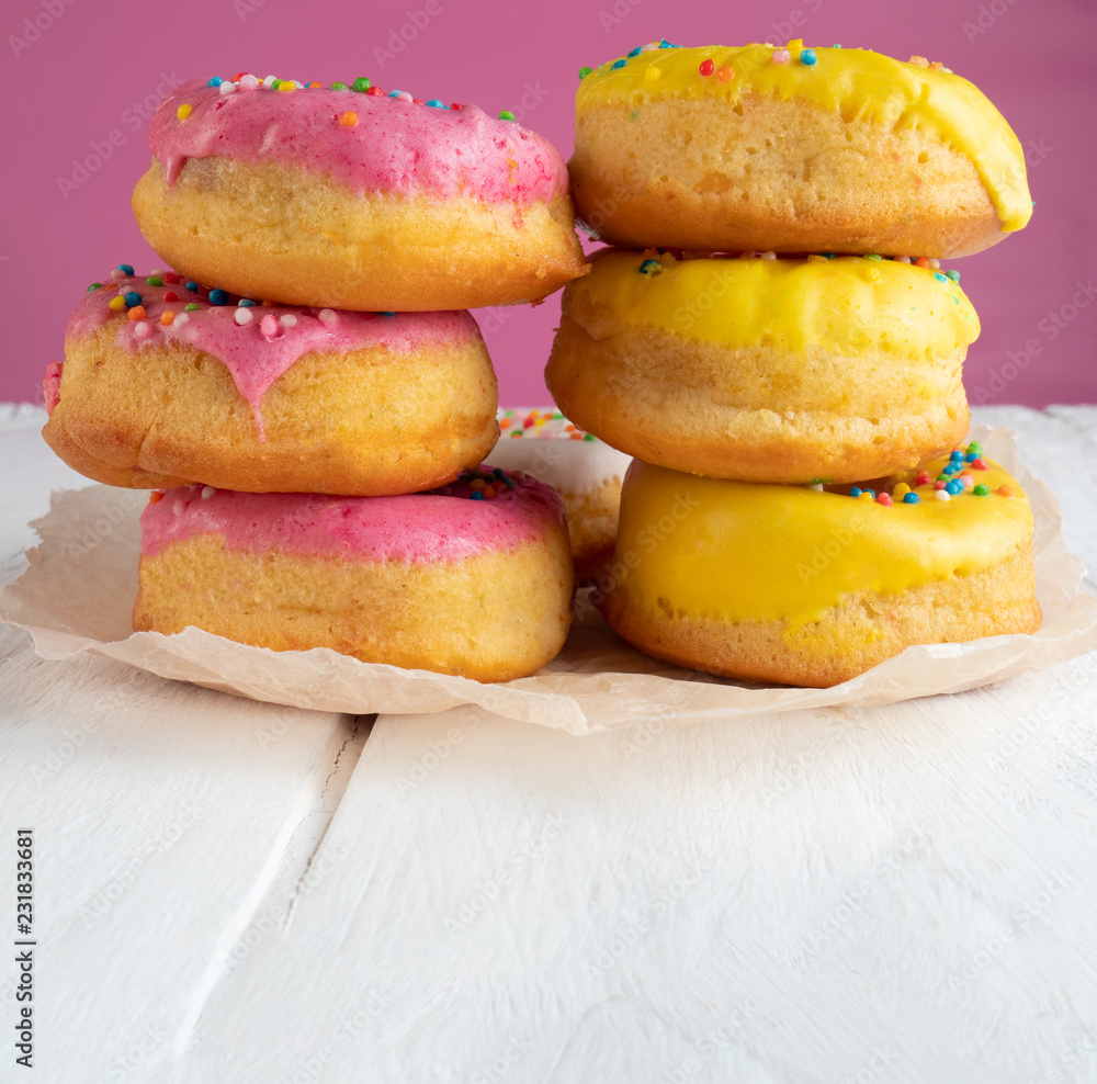 Colored donuts, copy space Colored donuts, copy space