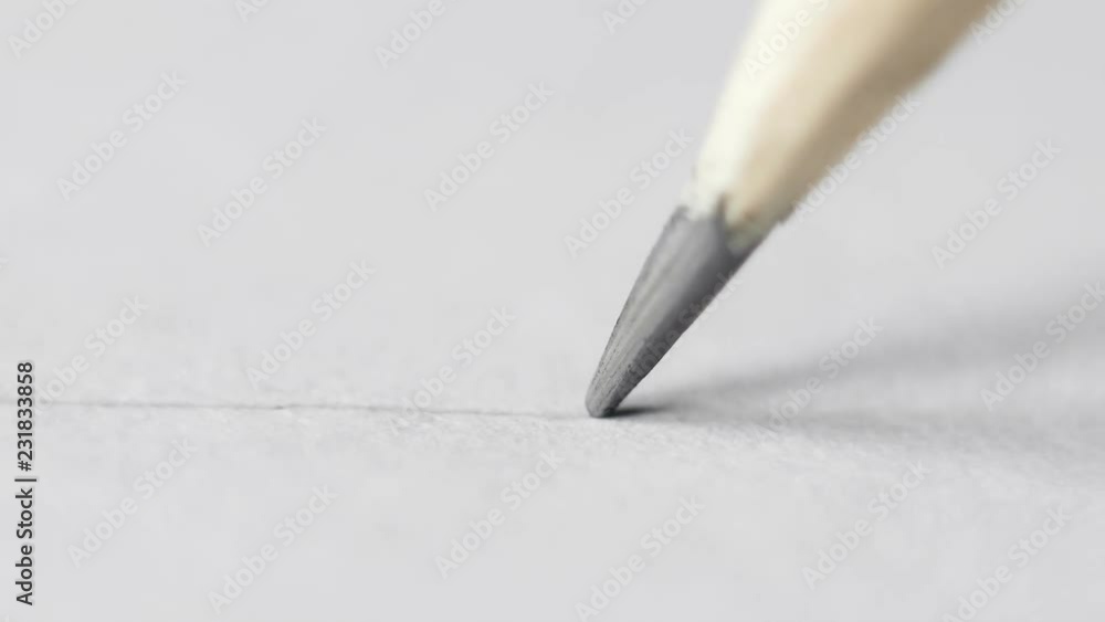 Designer makes pencil sketches on paper Designer makes pencil sketches on paper