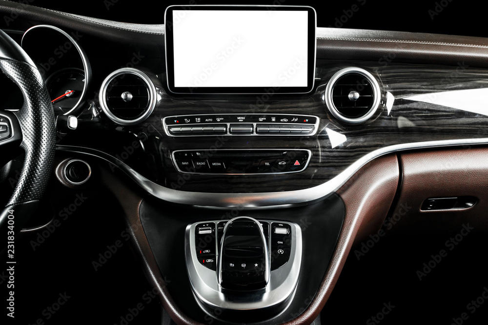 Monitor in car with isolated blank screen use for navigation maps and GPS. Isolated on white with clipping path. Car detailing. Modern car interior details.