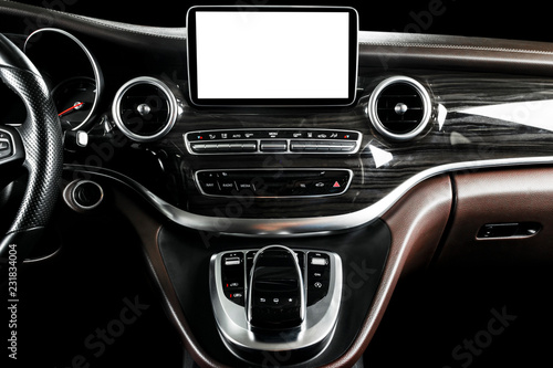 Monitor in car with isolated blank screen use for navigation maps and GPS. Isolated on white with clipping path. Car detailing. Modern car interior details. © Aleksei