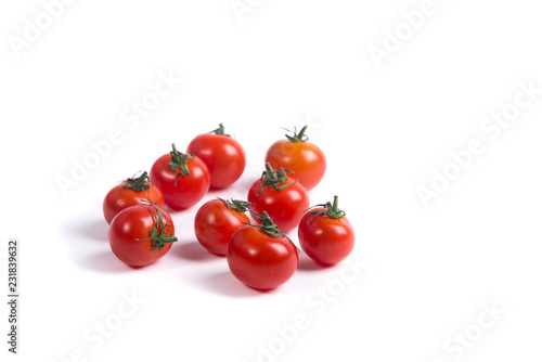 Cherry tomatoes on white surface