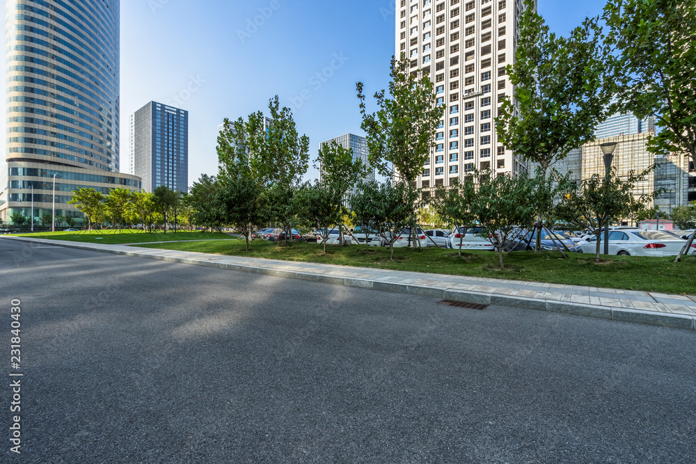empty urban road with modern building in the city. empty urban road with modern building in the city.