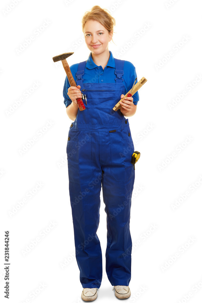 Frau im Blaumann als Handwerker mit Werkzeug Stock Photo
