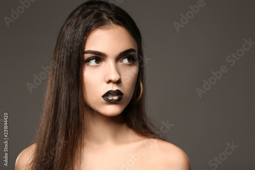 Beautiful young woman with ...