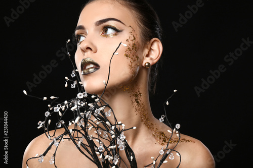 Beautiful young woman with ...
