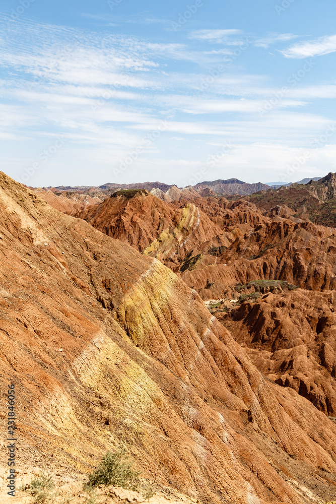 Obraz premium Striped rock formations in Danxia Feng, or Colored Rainbow Mountains, in Zhangye, Gansu, China. Here the view from the Sea of Clouds observation deck