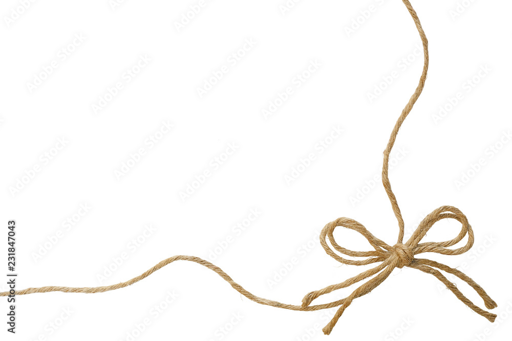 Natural Jute twine or burlap string with hemp rope bow border isolated on  white background. Stock Photo