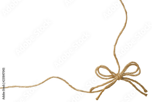 Obraz na plátně Natural Jute twine or burlap string with hemp rope bow border isolated on white background