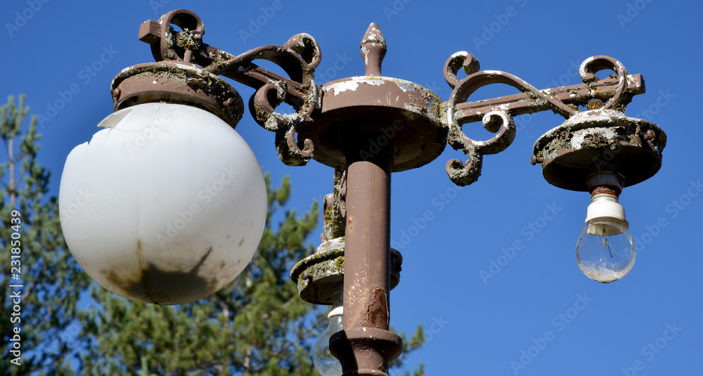 old street lamp on blue sky background old street lamp on blue sky background