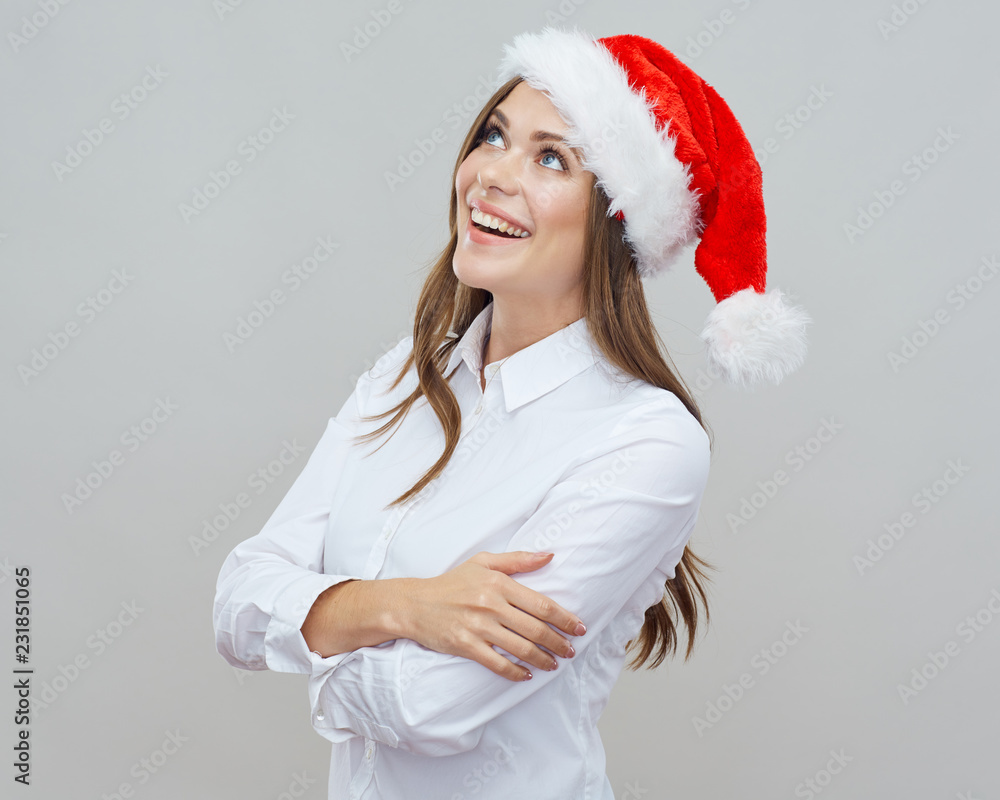 Business woman wearing Santa red hat. Business woman wearing Santa red hat.
