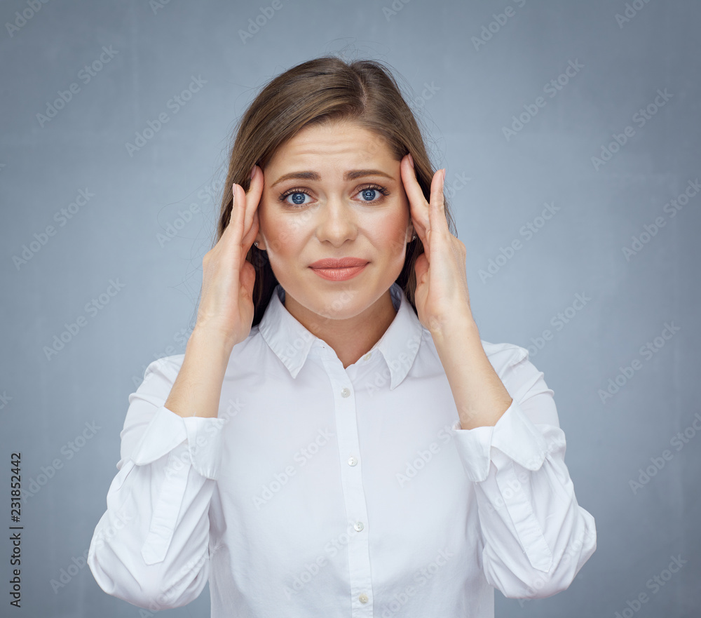 Portrait of woman with headache migraine pain Portrait of woman with headache migraine pain