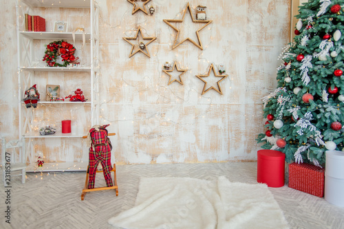 Interior living room with a Christmas tree and decorations. Children's room