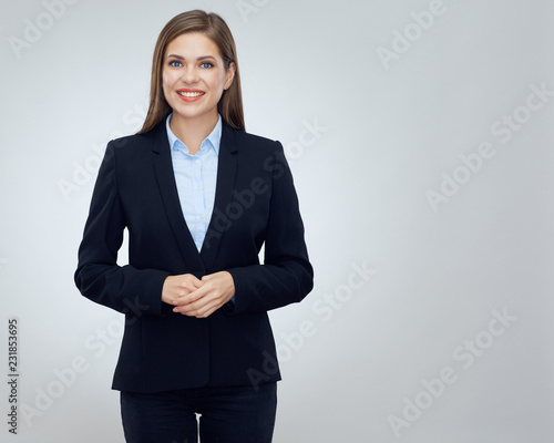 Smiling young business woman wearing black suit
