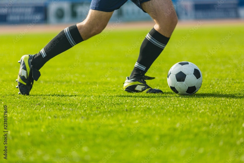 Closeup of a Soccer Player Legs in Action