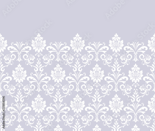Wallpaper in the style of Baroque. Seamless vector background. White and grey floral ornament. Graphic pattern for fabric, wallpaper, packaging. Ornate Damask flower ornament.