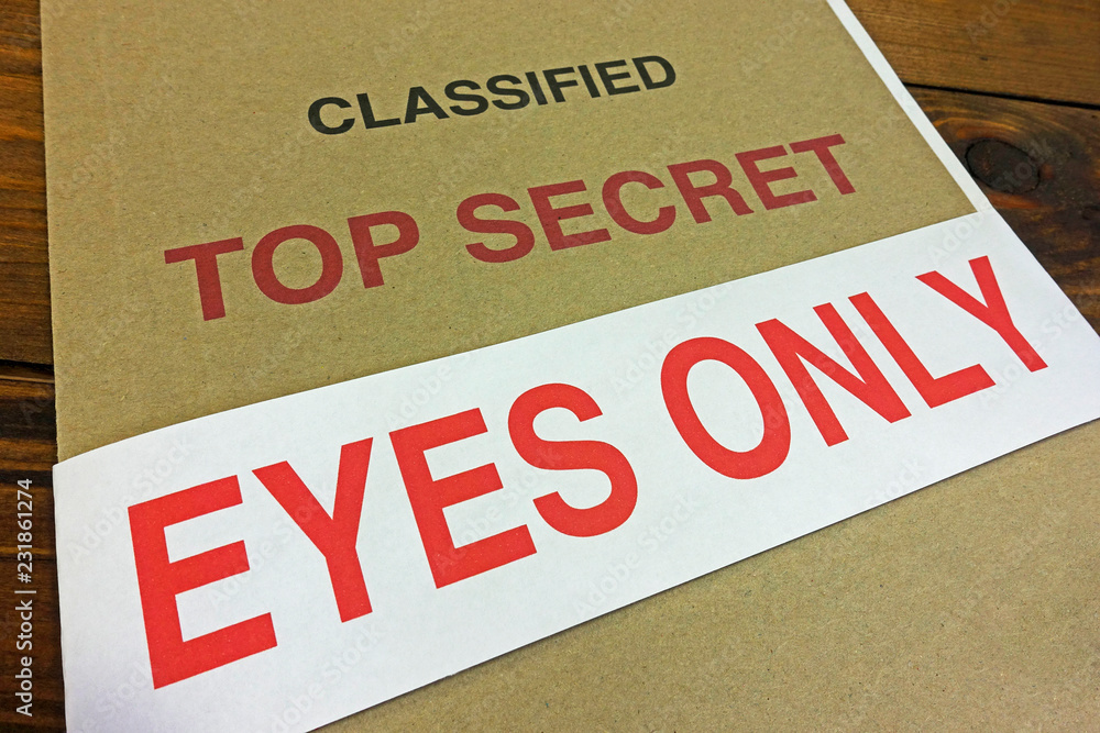 An EYES ONLY sealing strip around a top secret file.